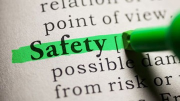 The word Safety being highlighted in a book