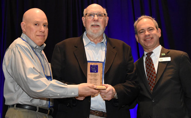 Ivan Cooper receiving the 2019 SWANA Landfill Management Technical Division Distinguished Individual Achievement Award