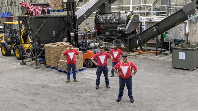 Employees at the Muscatine Organic Recycling Center