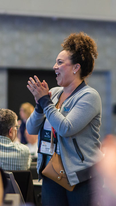 An attendee gives an applause at WASTECON 2022