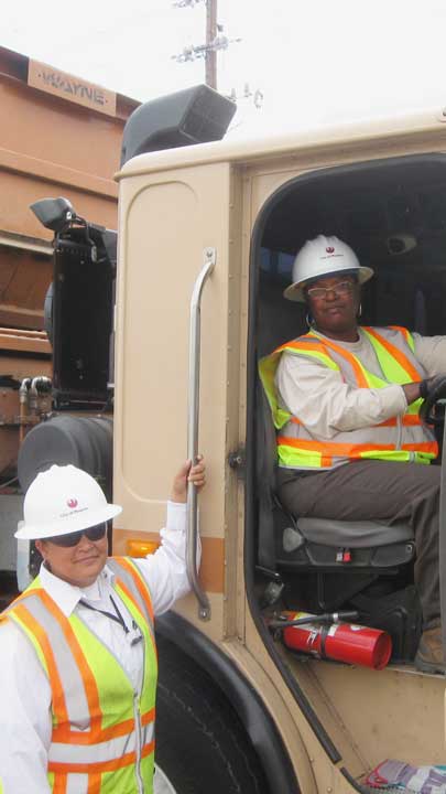 Two female recycling truck drivers in Phoenix, AZ